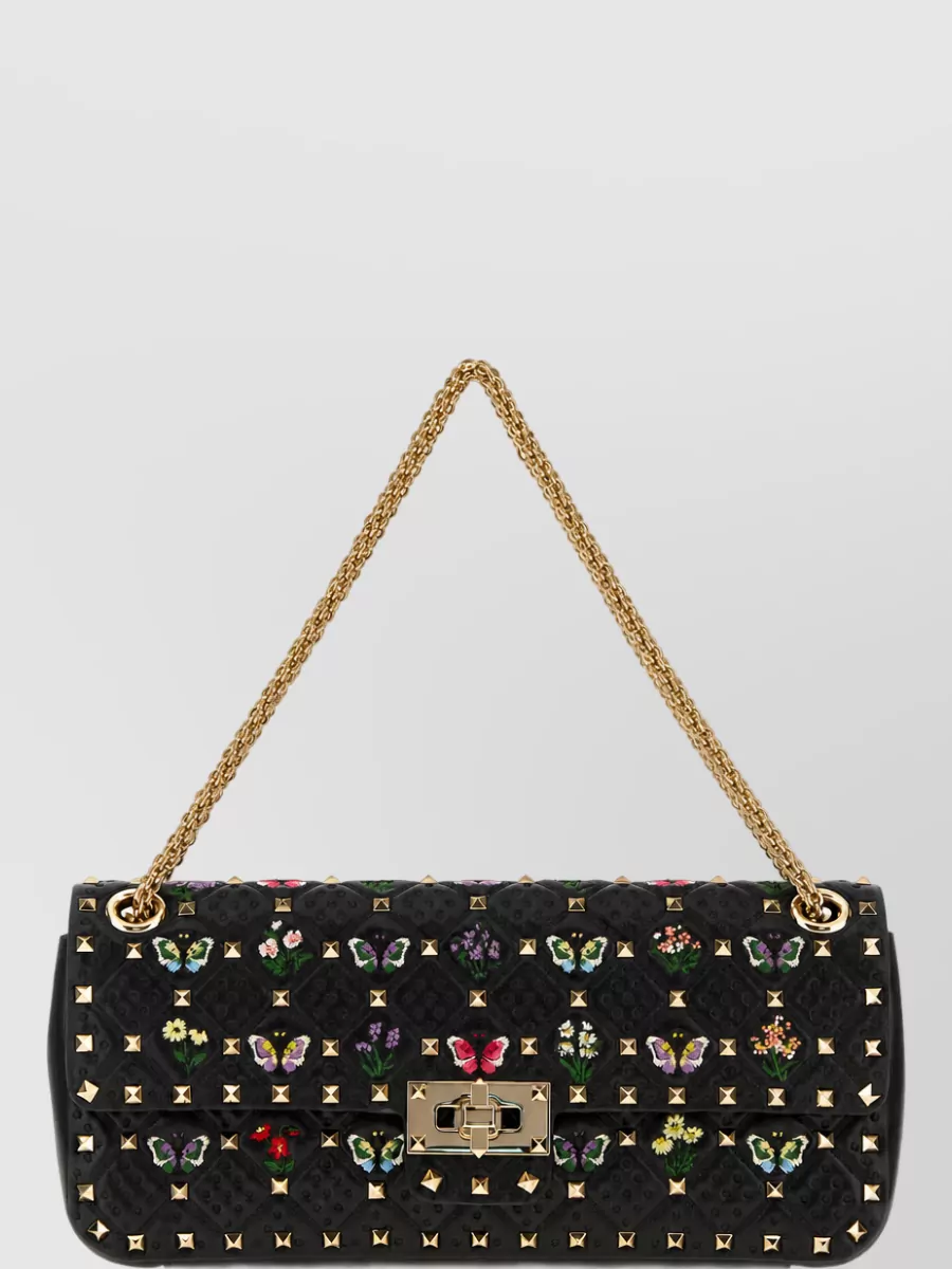 Valentino Garavani rockstud spike medium leather quilted clutch bag