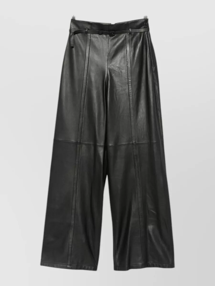 Emporio Armani Lamb leather paneled wide-leg trousers — The Emporio Armani high-waisted wide-leg trouser offers a refined, architectural line that balances the relaxed sweatshirt and keeps the head-to-toe black palette polished rather than sporty.