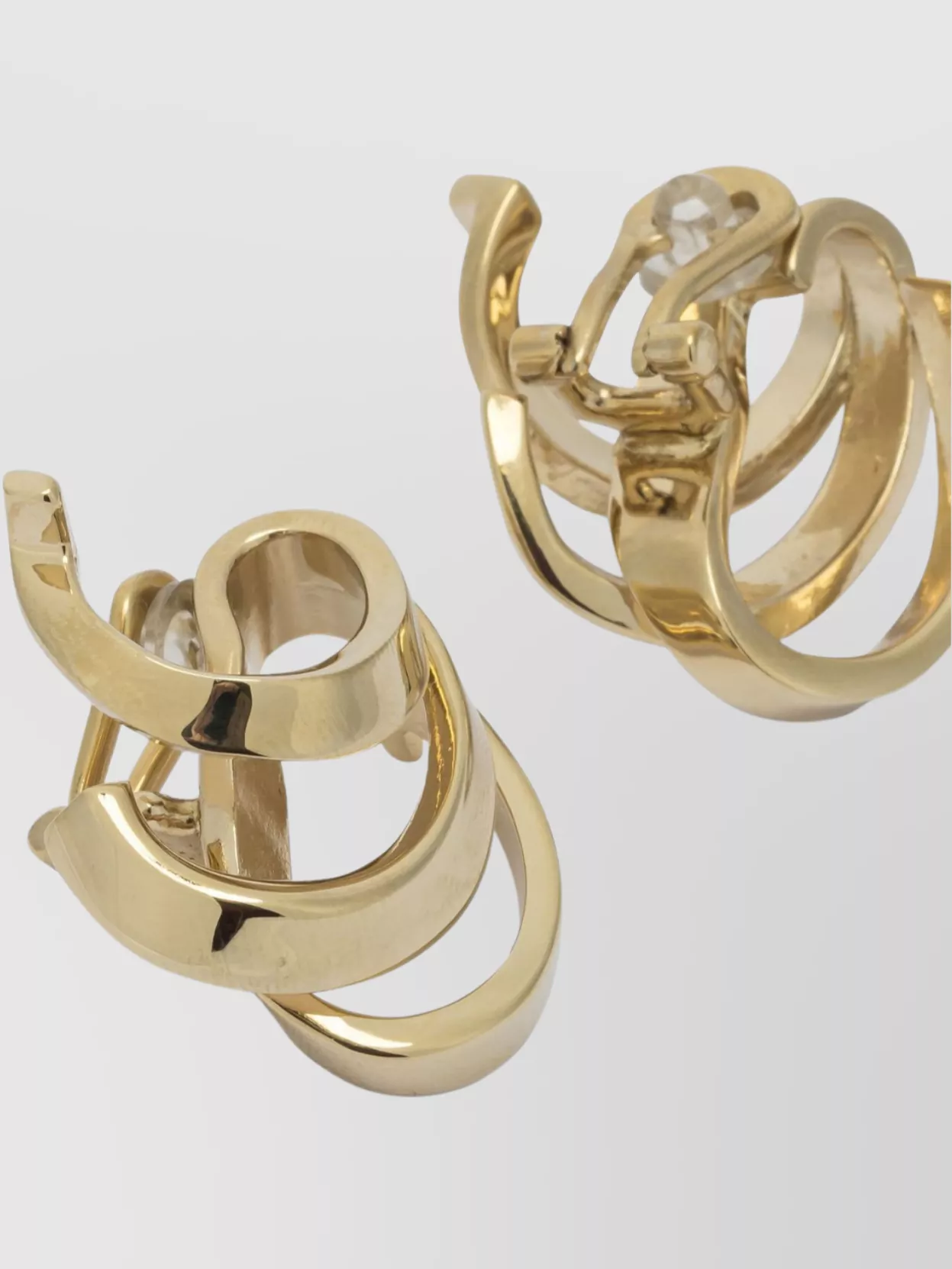 Ferragamo Curved Leaf Design Earrings In Gold
