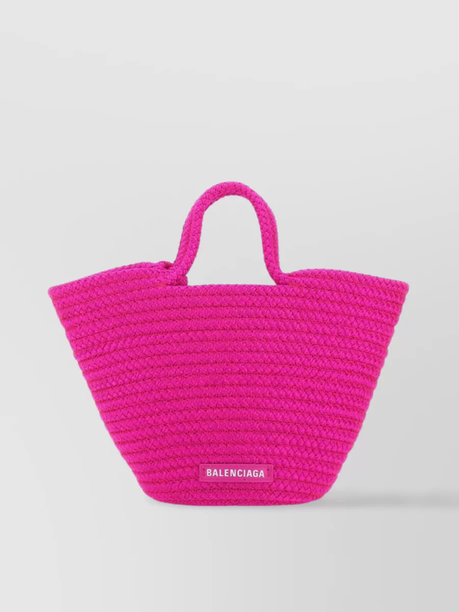 Shop Balenciaga Small Ibiza Handbag With Woven Rope Detail In Pink