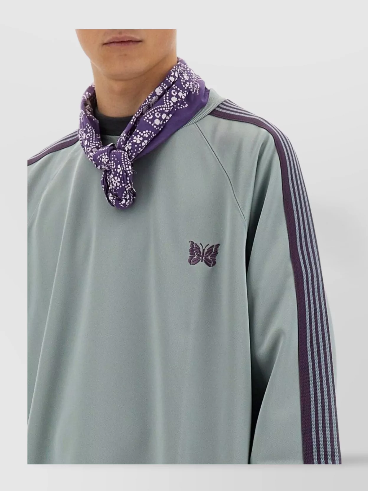NEEDLES EMBROIDERED RAGLAN SLEEVE SWEATSHIRT WITH STRIPED RIBBED HEM