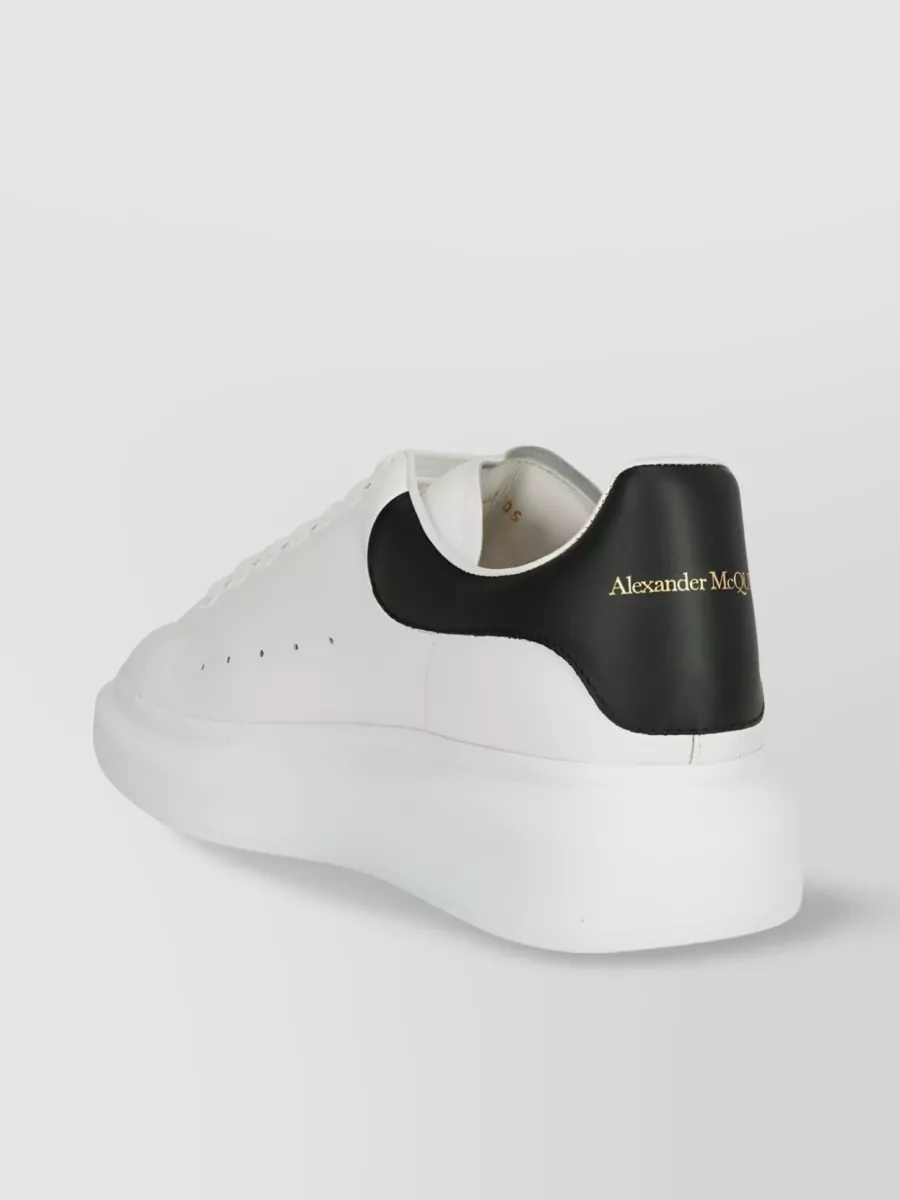 Shop Alexander Mcqueen Oversized Leather Sneakers Perforated Detailing In White