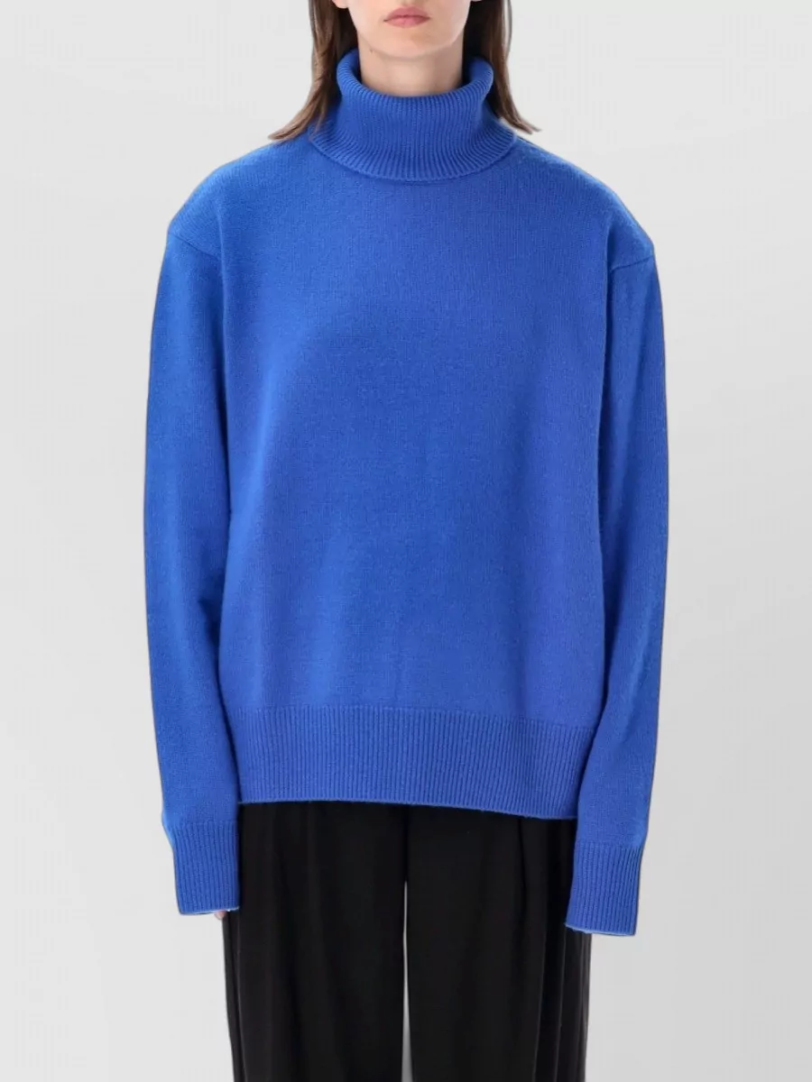 The Frankie Shop cashmere wool ribbed relaxed fit padded shoulder turtleneck sweater