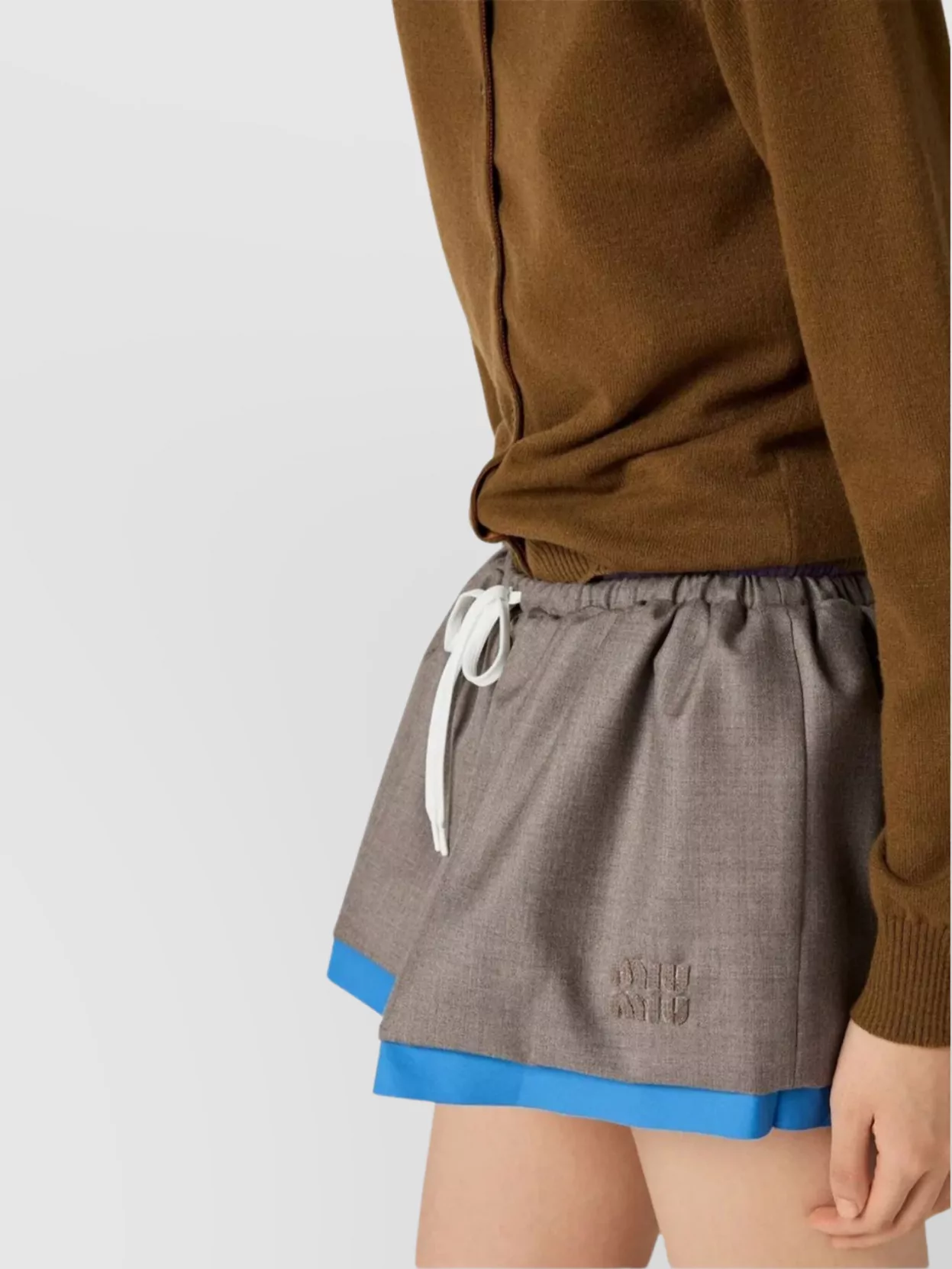 Miu Miu Knitwear With Ribbed Cuffs And Hem In Brown