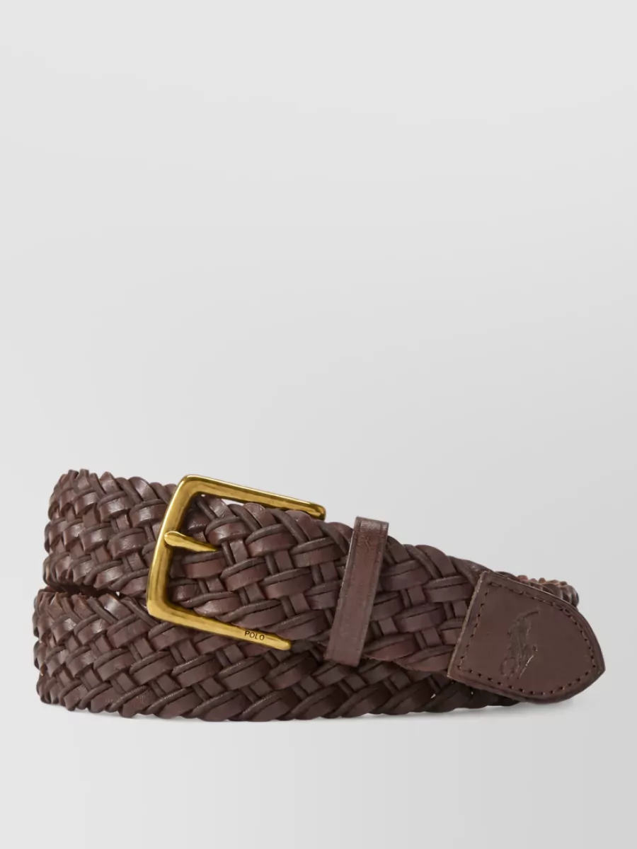 Polo Ralph Lauren Leather belt — The dark brown woven Polo belt adds subtle structure and warmth at the waist without fighting the light palette, giving a discreet collegiate finish to the relaxed track-inspired trouser.