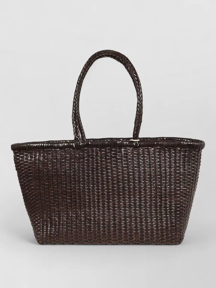 Dragon Diffusion Na leather basket bag — The Dragon Diffusion structured woven tote in deep chocolate brown picks up the suit’s color and adds artisanal texture, perfect for a polished beach-to-city day.