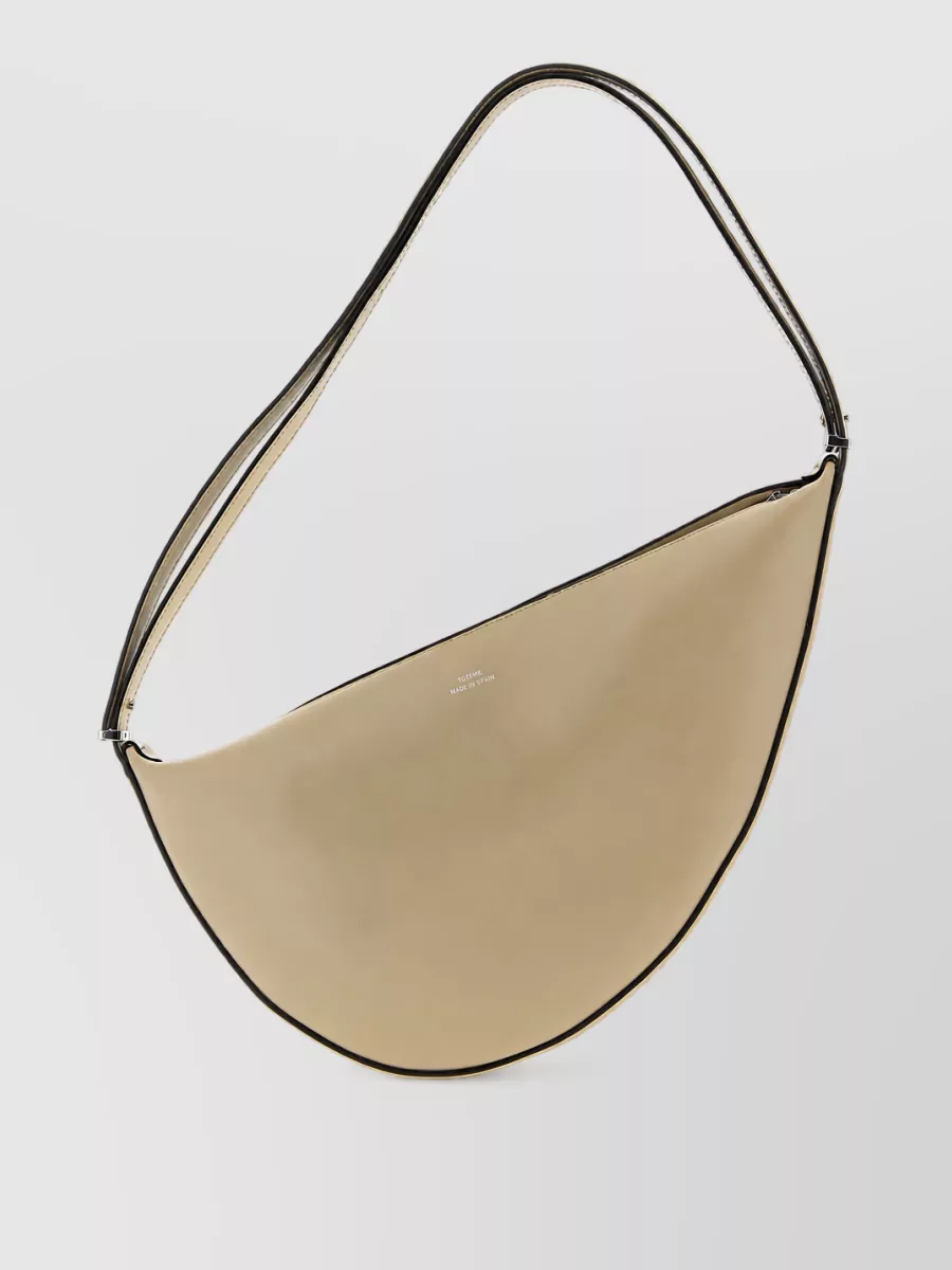 Totême leather clutch bag