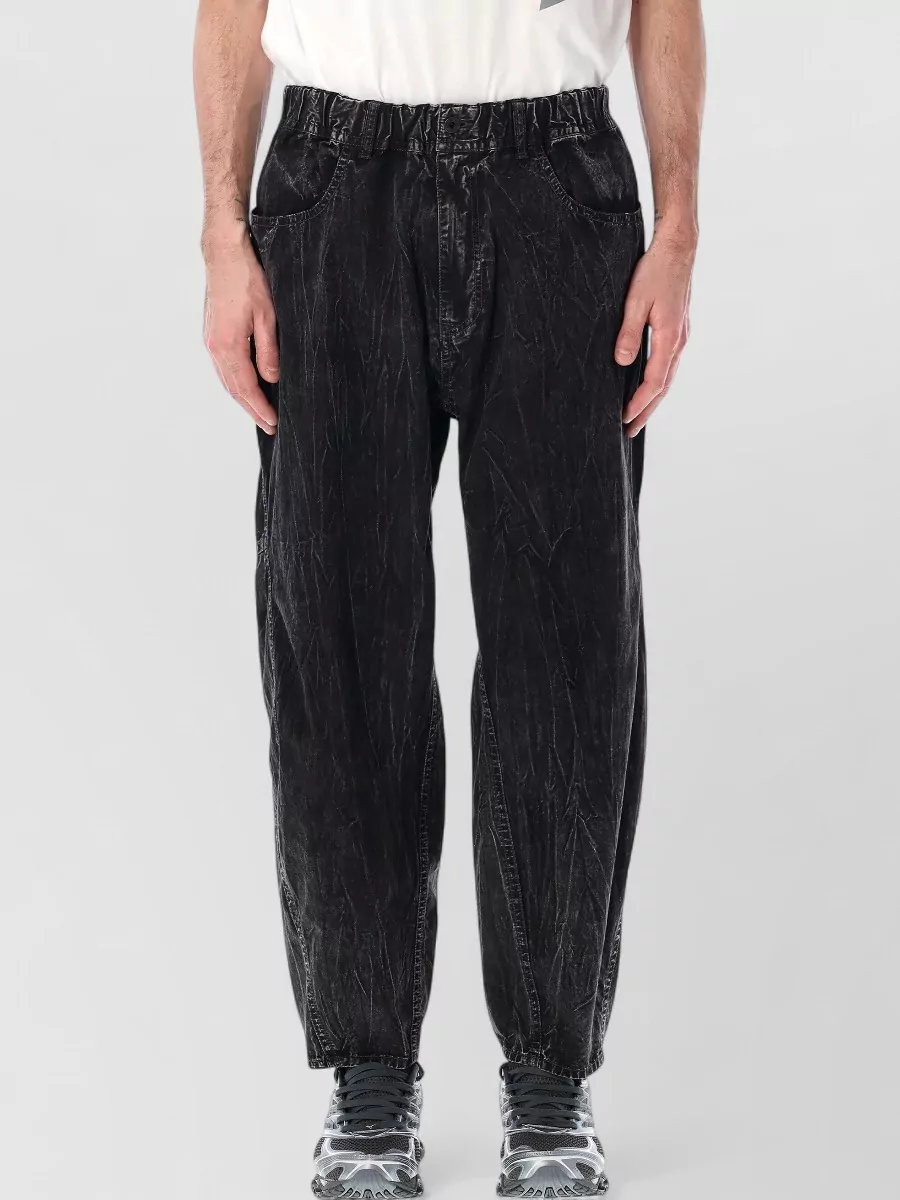 And Wander textured cotton relaxed-fit trousers