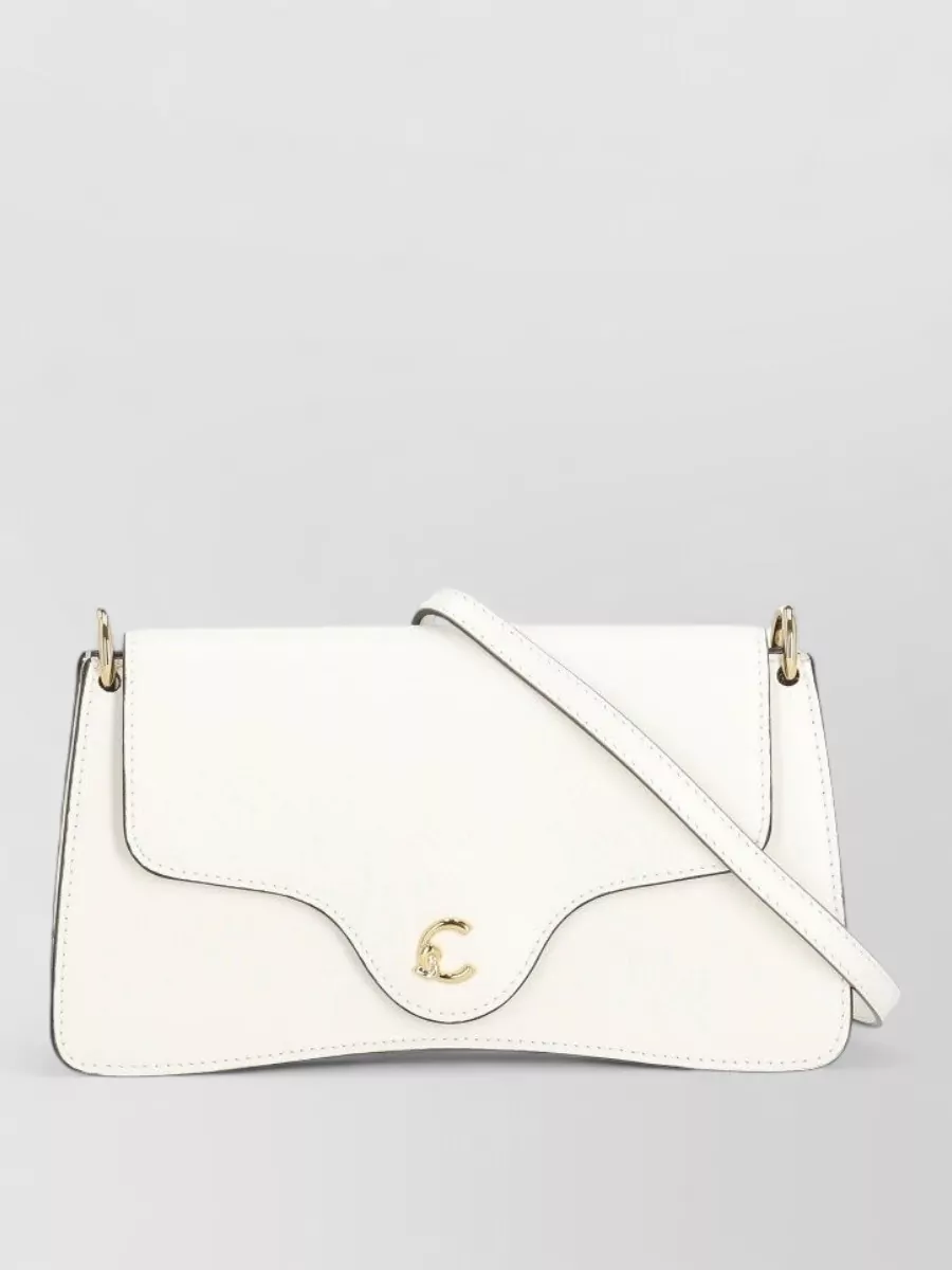 Coccinelle Leather shoulder bag — The small soft-white Coccinelle flap bag is structured but gentle, matching the dress’s clean minimalism and formality level while keeping the outfit light and polished for daytime.