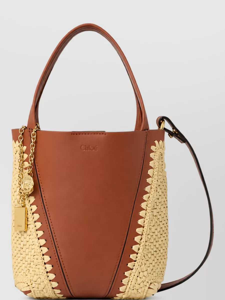Chloé Chloé Spin Small Raffia And Leather Woven Panels Charm Detail Bucket Bag