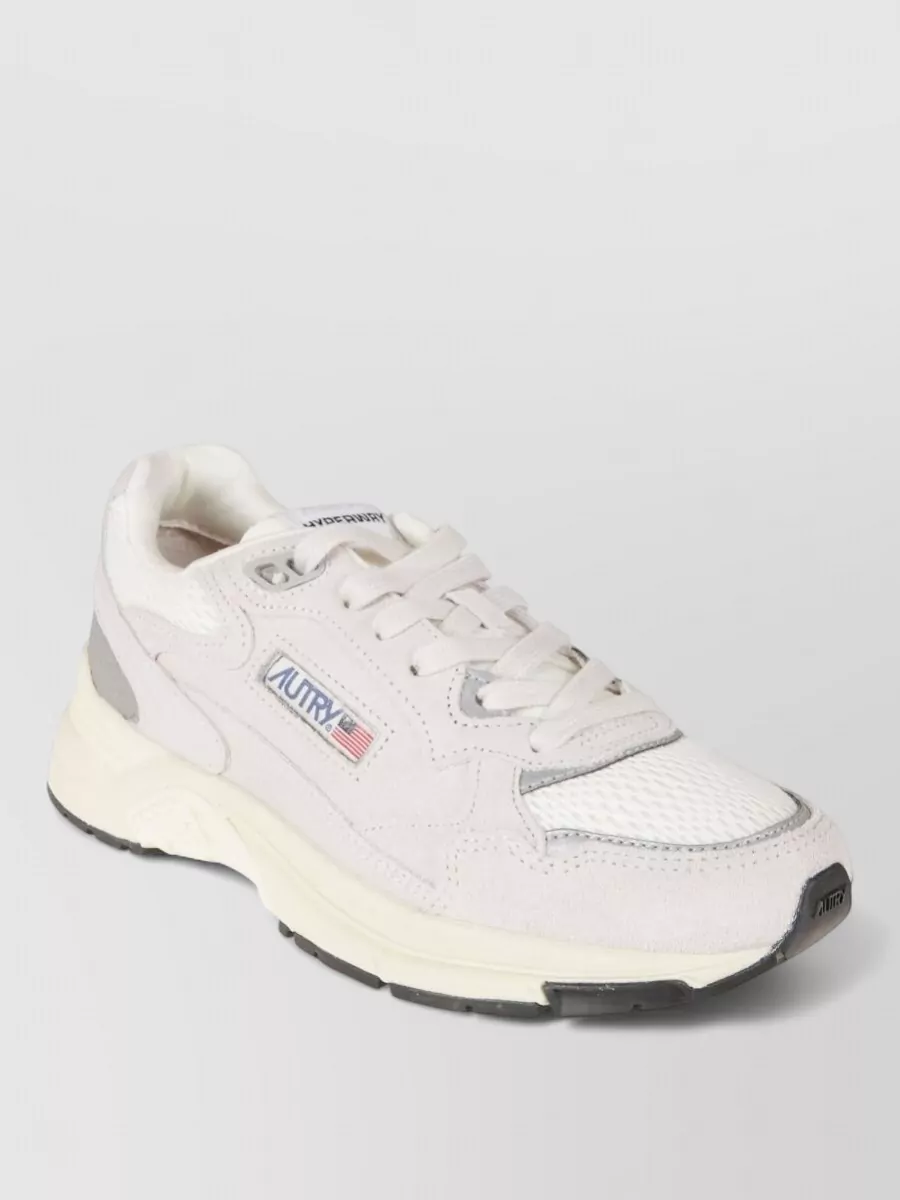 Autry leather paneled low-top sneakers