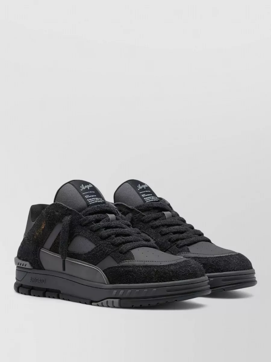 Axel Arigato leather paneled low-top sneakers