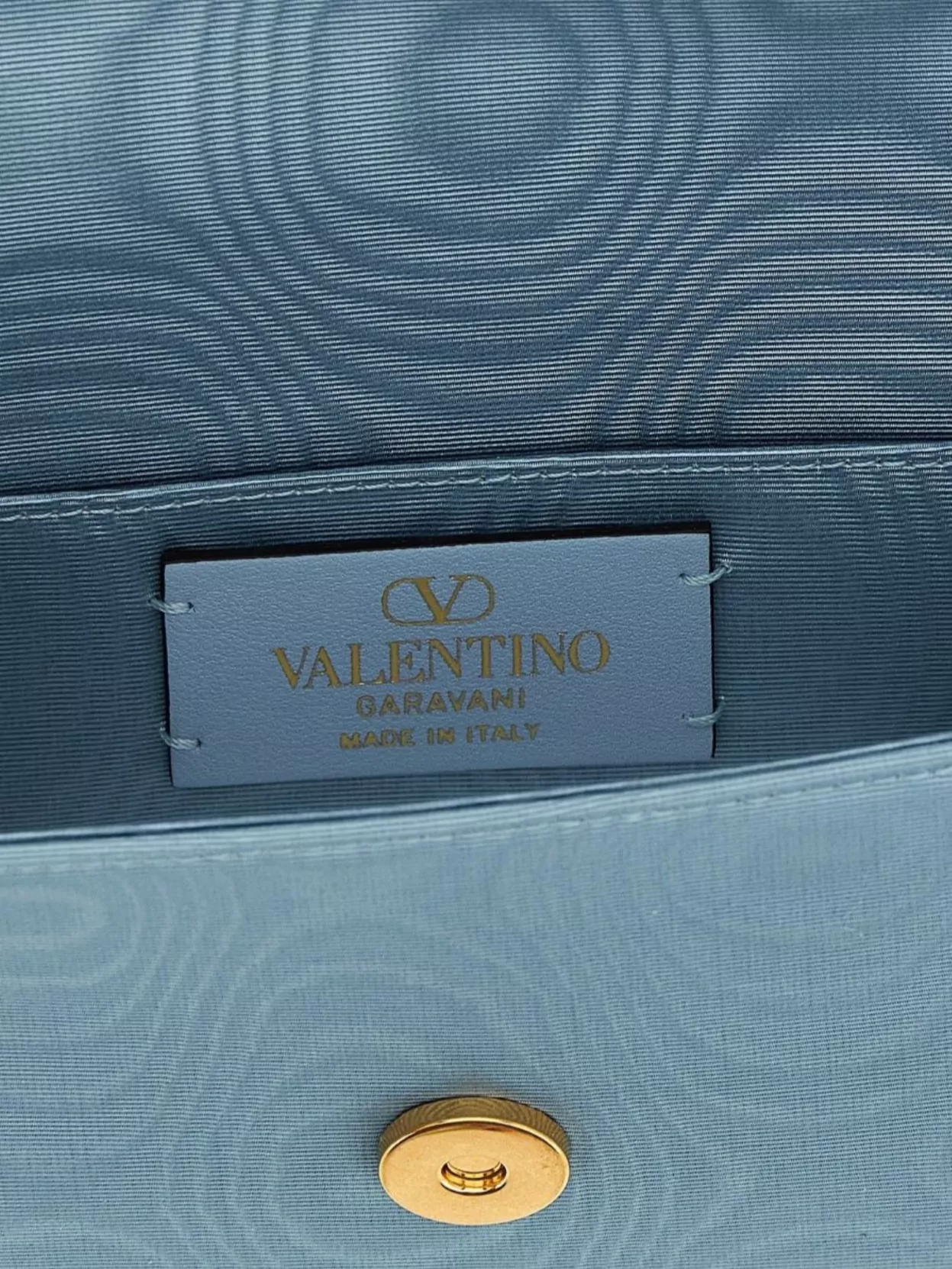 Valentino Garavani 'locò' clutch bag with adjustable chain