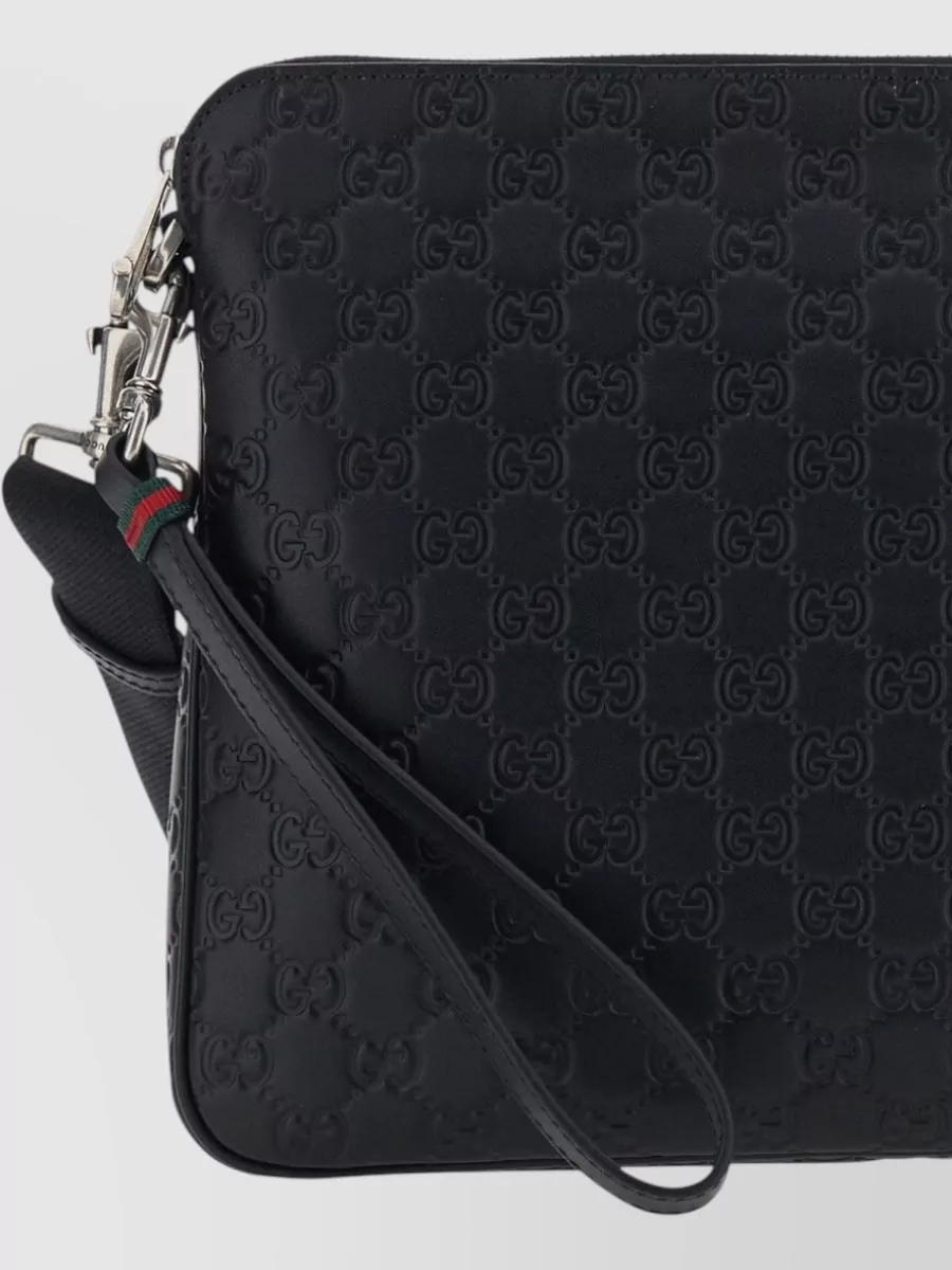 Gucci Gg Enblem Leather Clutch Bag