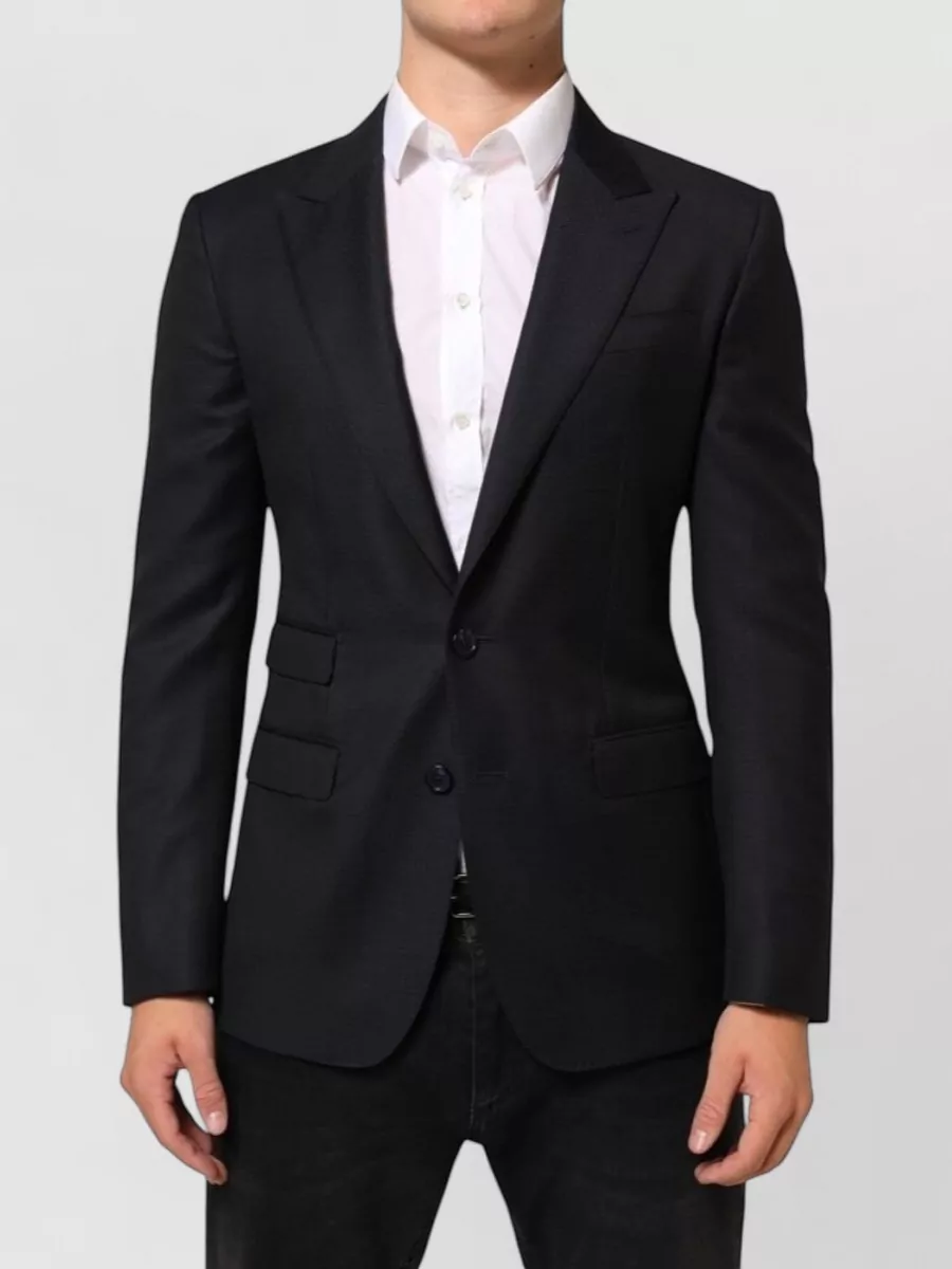 Dolce&Gabbana Wool two button suit blazer — The sharp single-breasted blazer respects the trouser’s tailored ease, giving a clean jacketed layer without locking the outfit into full suiting like the complete suits would.