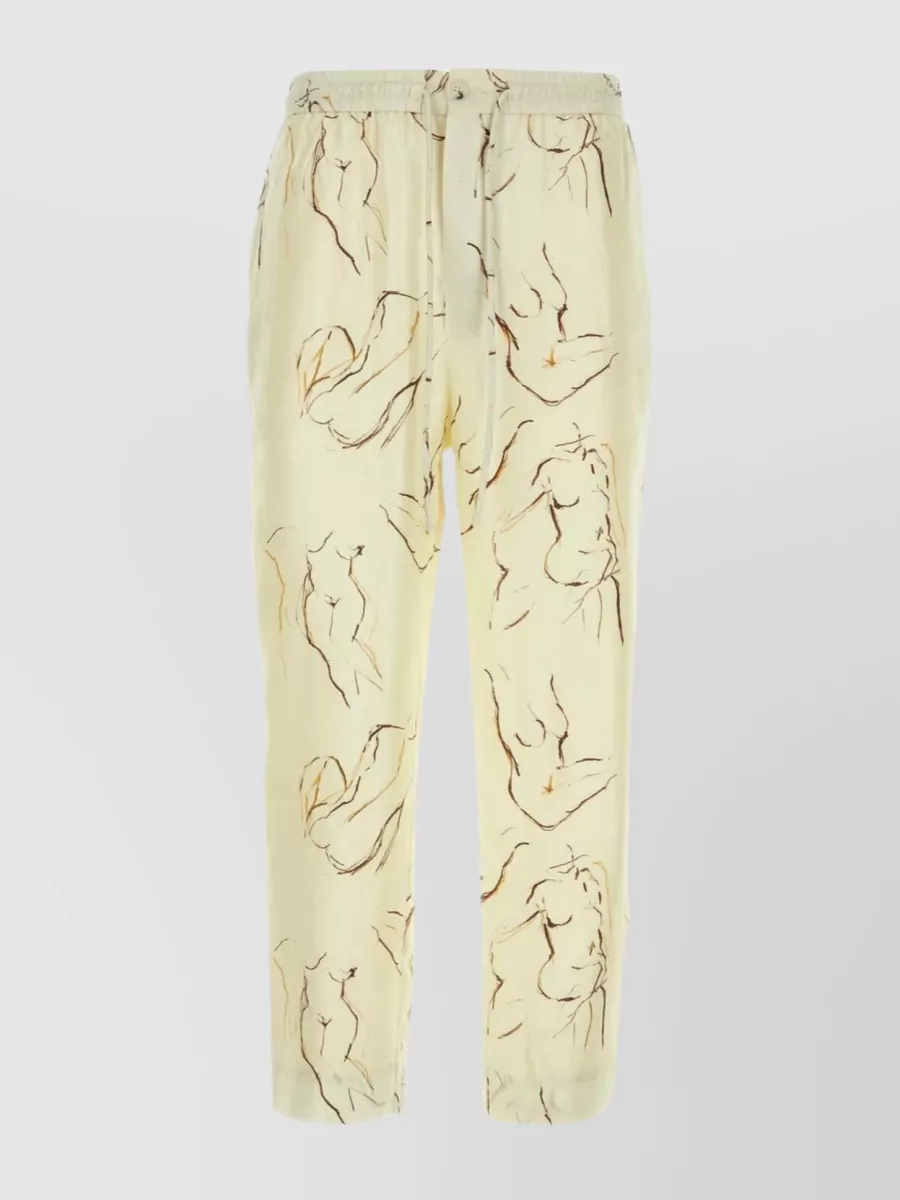Shop Nanushka Silk Satin Print Trousers In Yellow