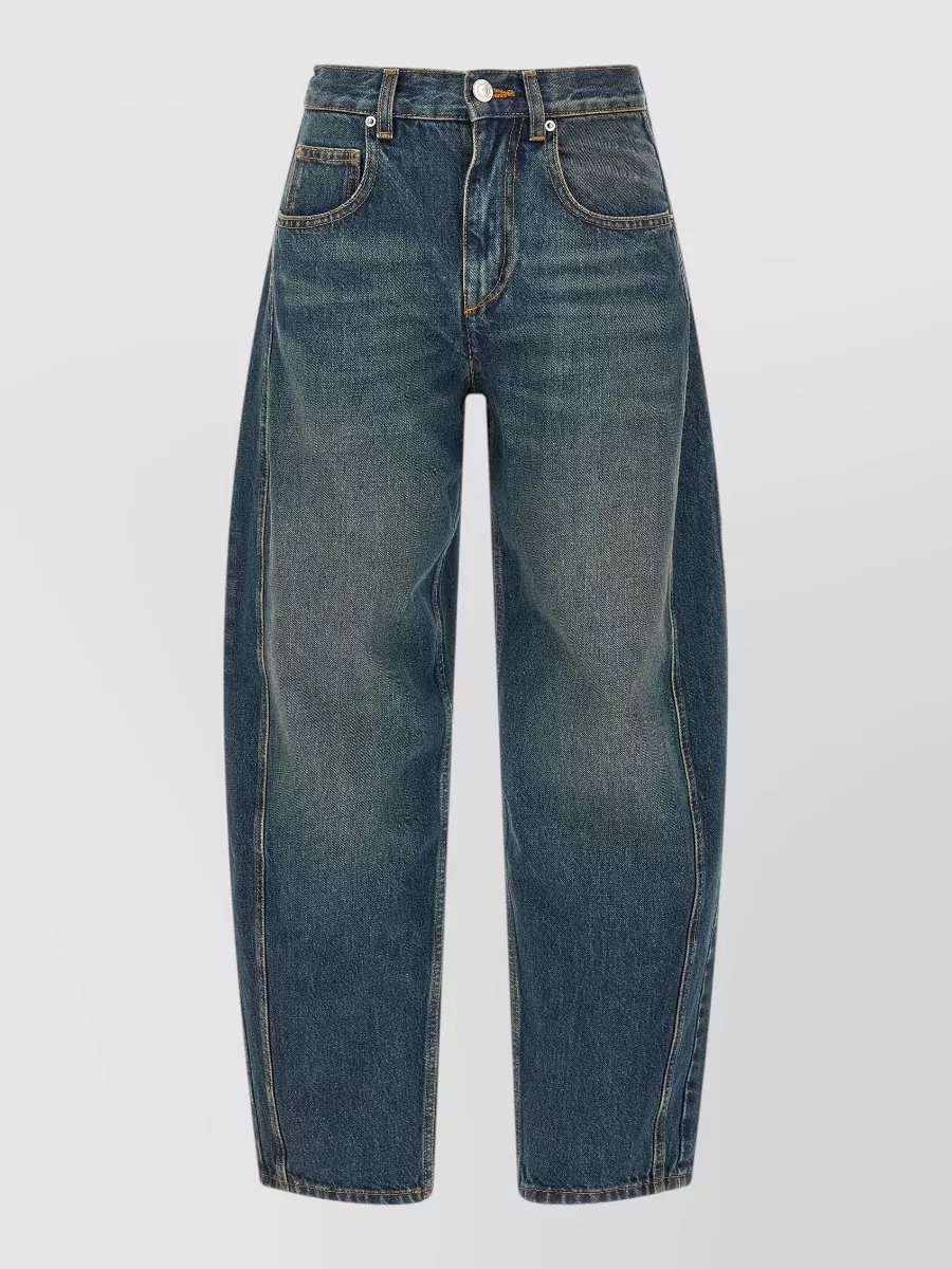 Isabel Marant Etoile Denim barrel-leg jeans — The high-rise wide-leg mid-indigo jean balances the boxy coat with volume through the leg, keeps the vibe casual and boho-street, and the blue wash softly picks up the coat’s stripes.