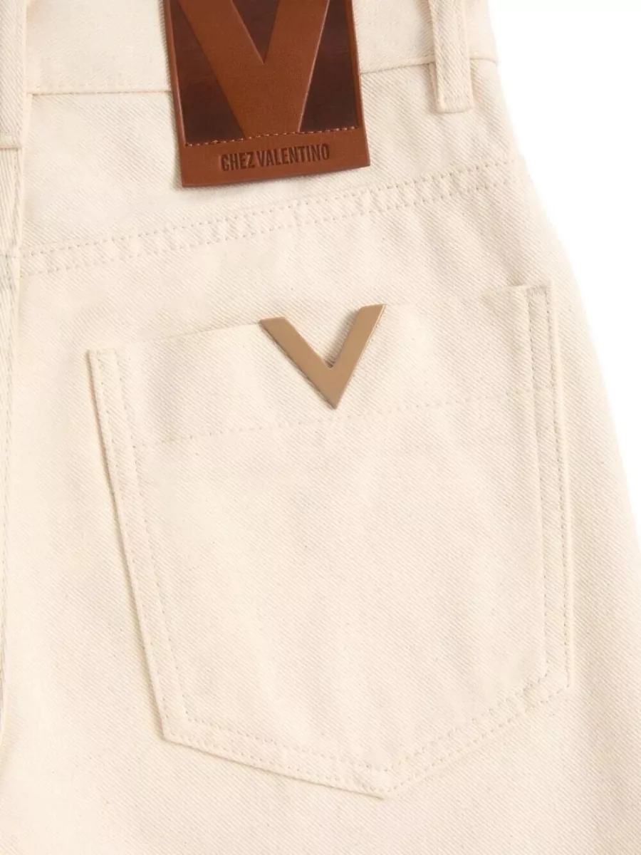 Valentino Garavani Flared Denim Trousers Featuring Pockets And Loops