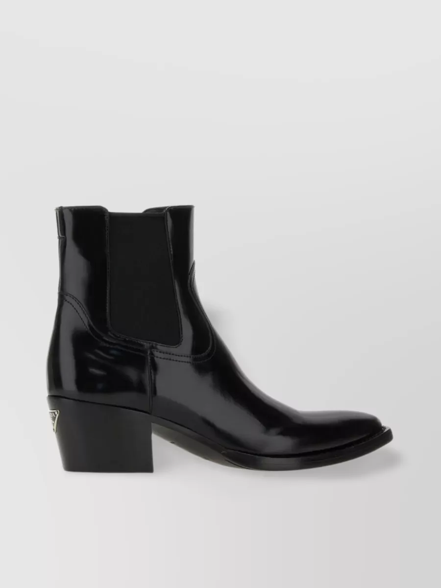 Shop Prada Chelsea Streamlined Leather Ankle Boots In Black
