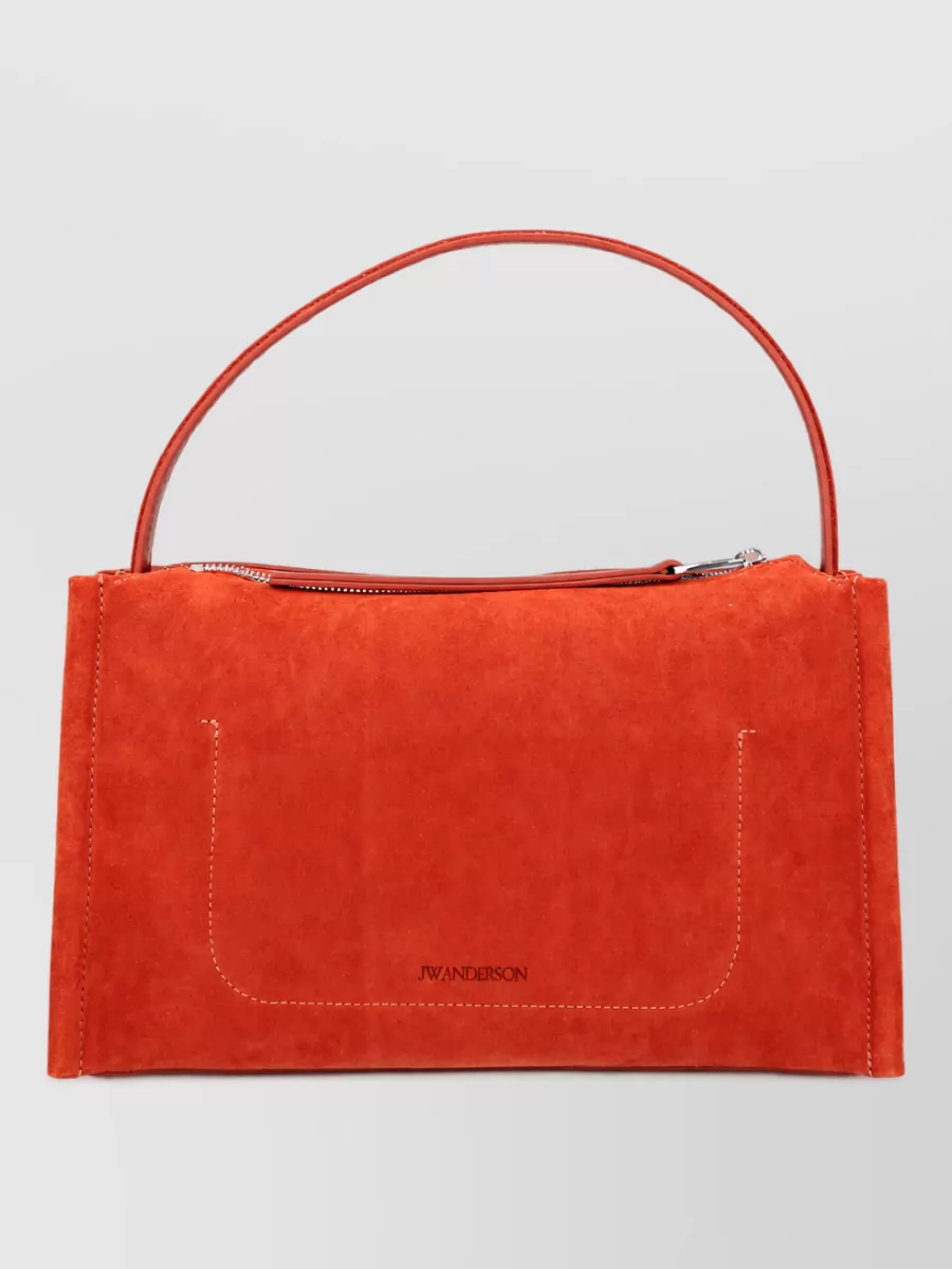 JW Anderson leather clutch bag