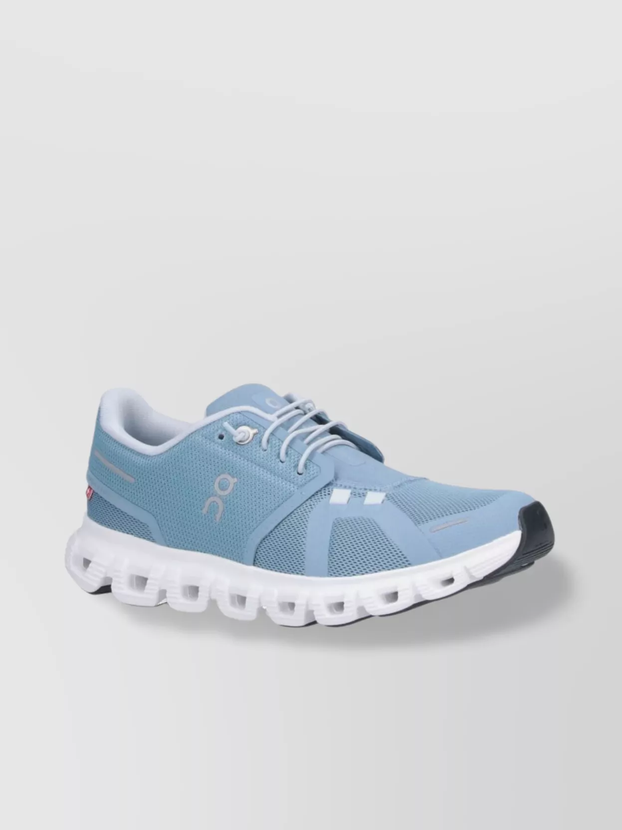 ON LOW TOP SNEAKERS WITH MESH UPPER AND RUBBER OUTSOLE