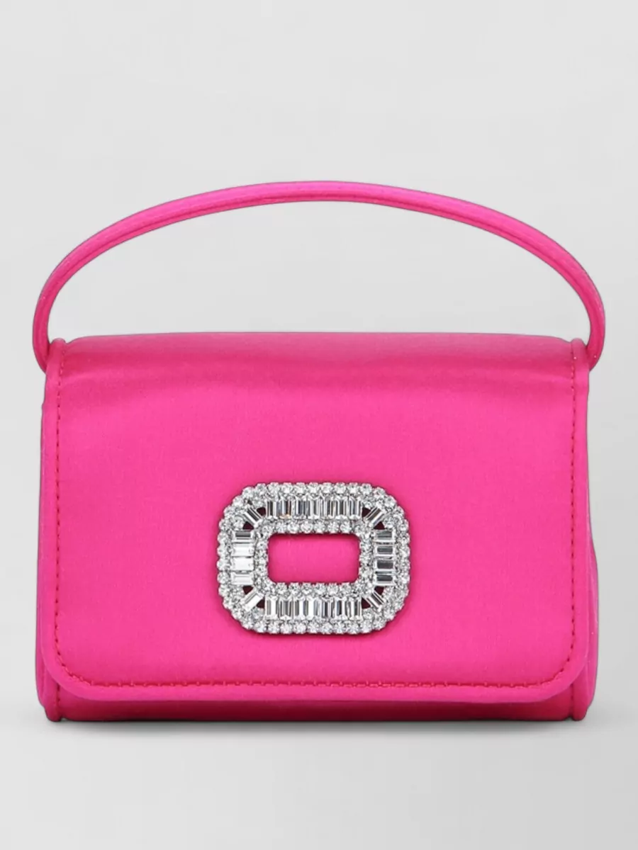 Roger Vivier Pilgrim nano shoulder bag — The black Versace baguette mirrors the shoes’ polish and Medusa gold hardware, grounding the neon palette with a compact, under-the-shoulder shape that feels very Y2K night-out.