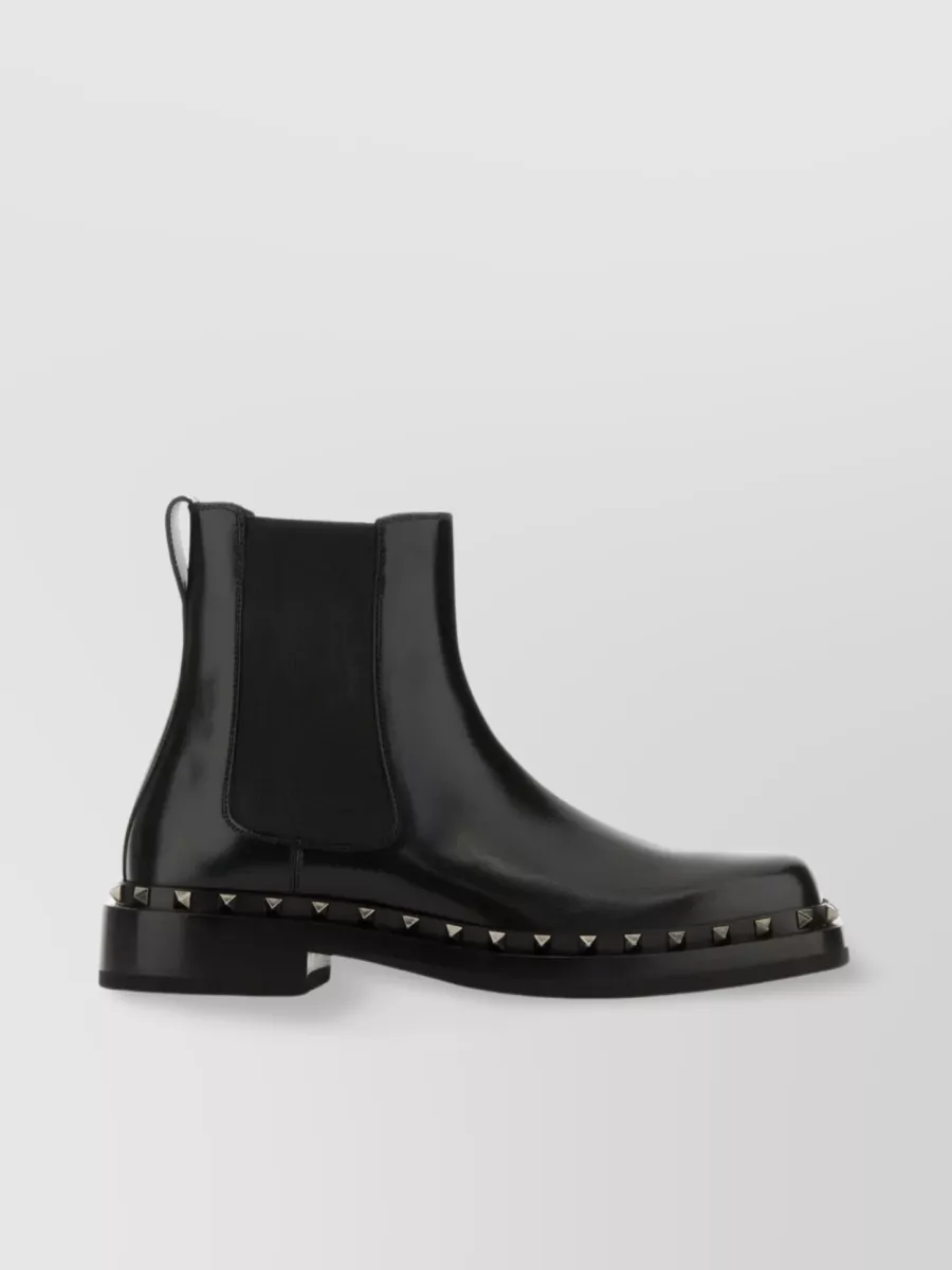 Shop Valentino Studded Calf Leather Elastic Ankle Boots In Black