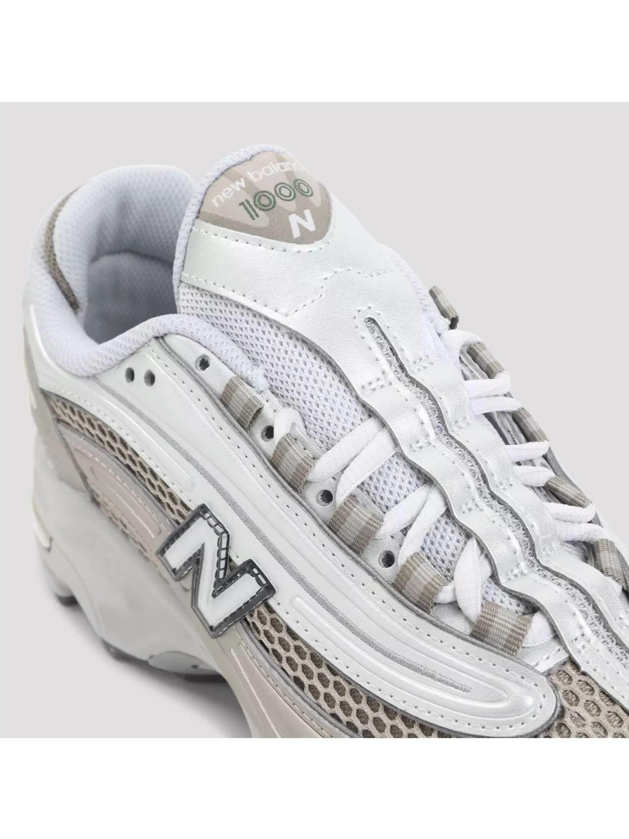 New Balance Contemporary Sneakers Featuring Mesh Panels And Reflective Accents