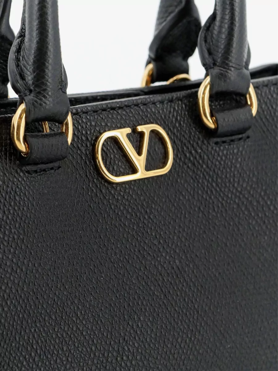 Valentino Garavani Vlogo Signature Mini Leather Clutch Bag