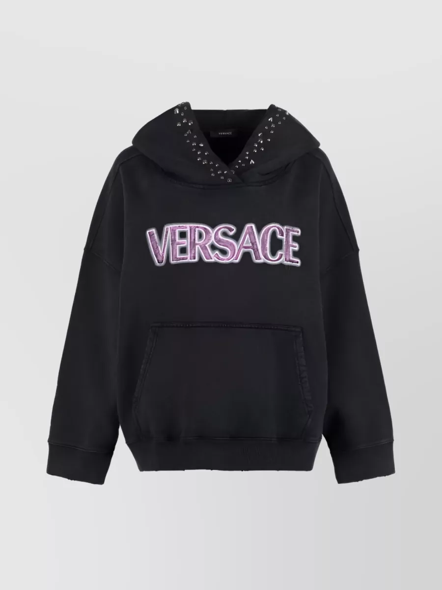 Shop Versace Logo Print Stud Embellishments Oversized Cotton Hoodie In Black