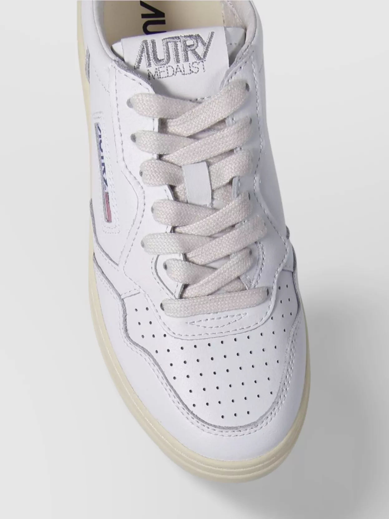 Autry Low Sneaker Featuring Perforated Detailing