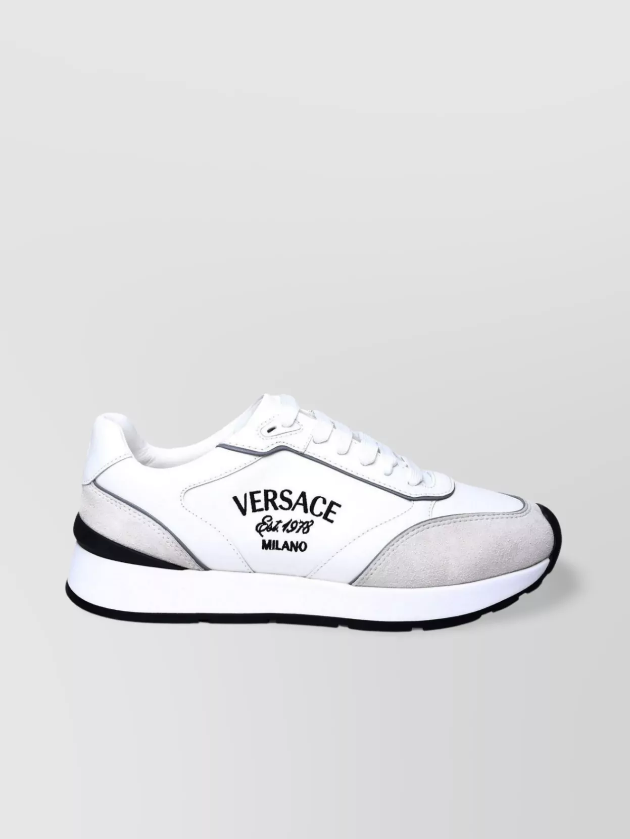 Shop Versace Sneakers Leather Suede Accents