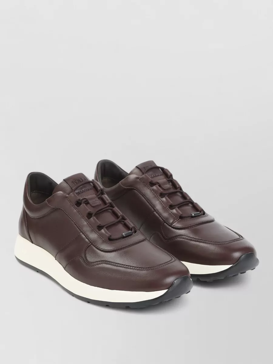 Tod's leather low-top lace-up sneakers
