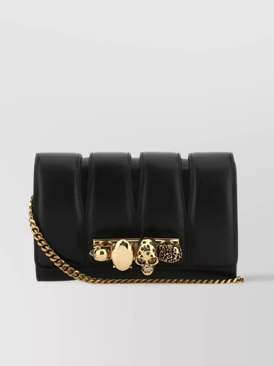 Shop Alexander Mcqueen Skull Quilted Four Ring Clutch In Black