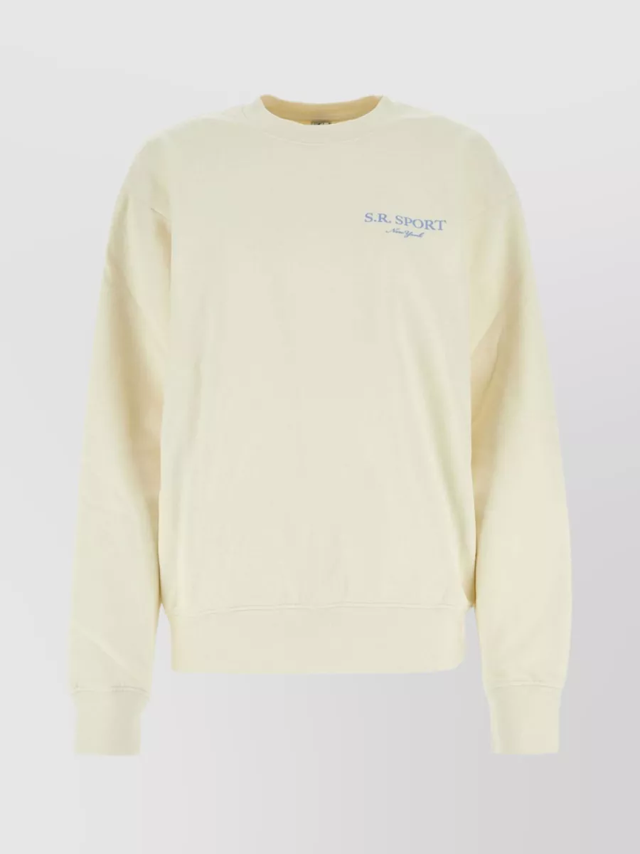 Shop Sporty And Rich Relaxed Cotton Sweater With Ribbed Crew-neck And Cuffs In Cream
