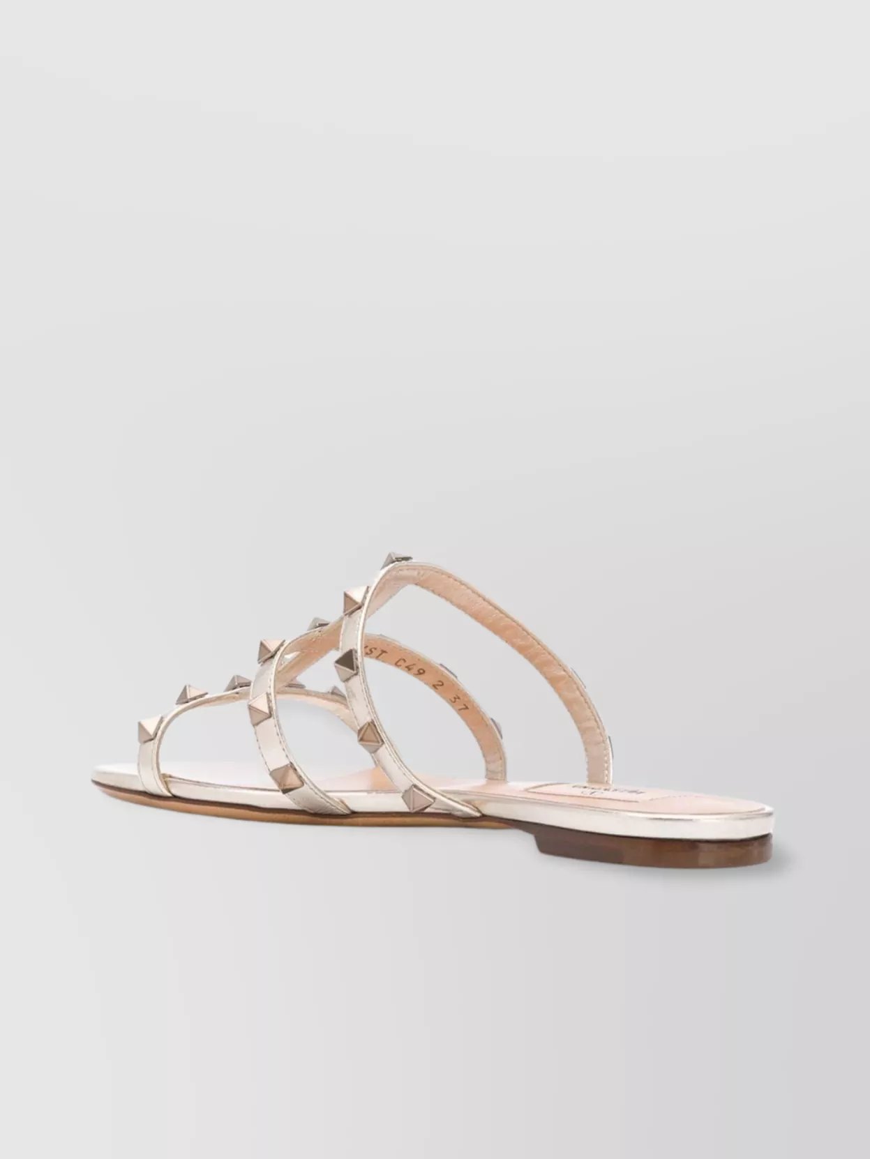 Valentino Garavani Flat Sandals With Gold-Tone Rockstud Embellishments