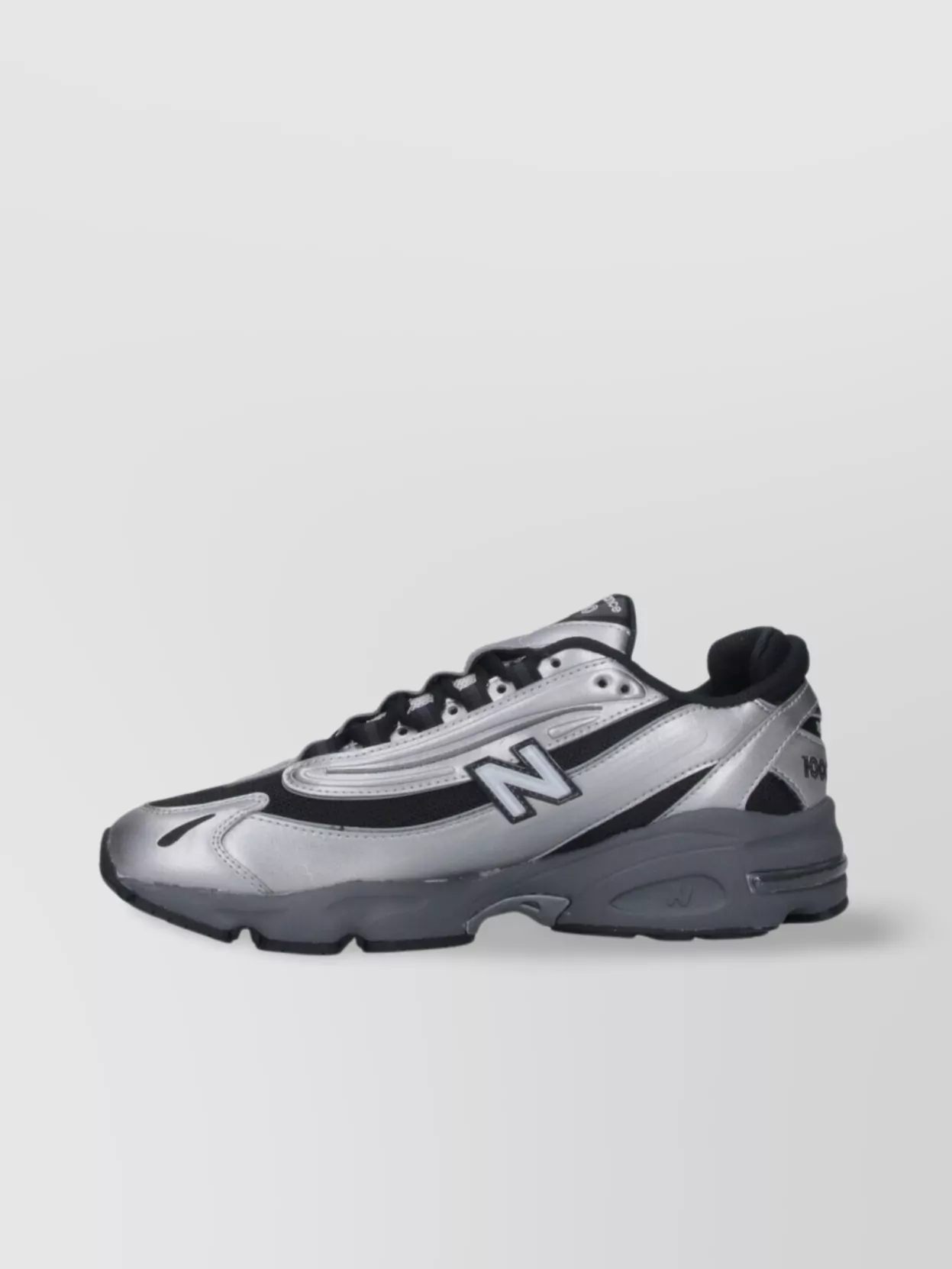 New Balance Low Top Sneakers With Mesh Panels And Reflective Accents