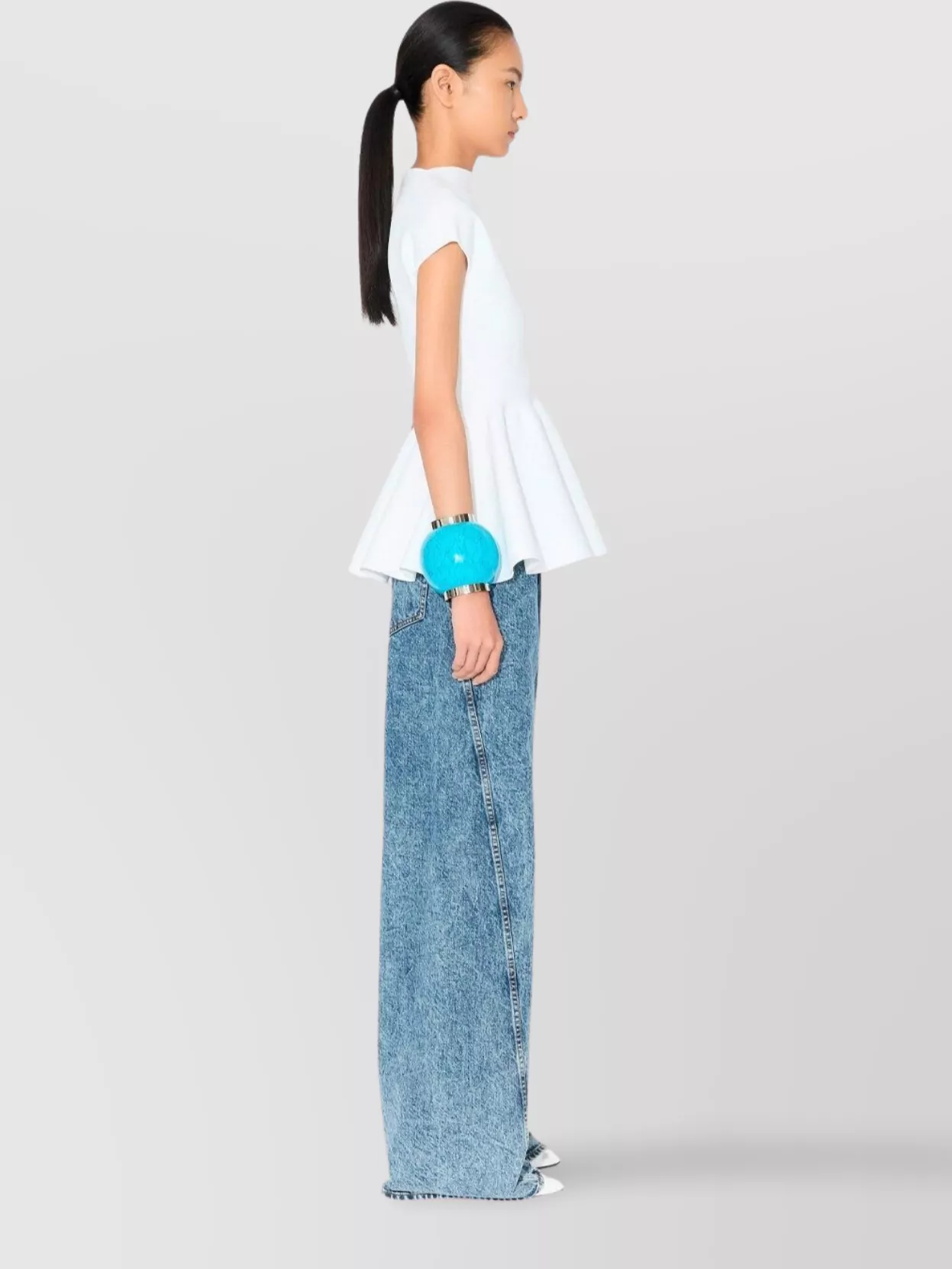 Alaïa Twisted Low Waist Denim Pants In Blue