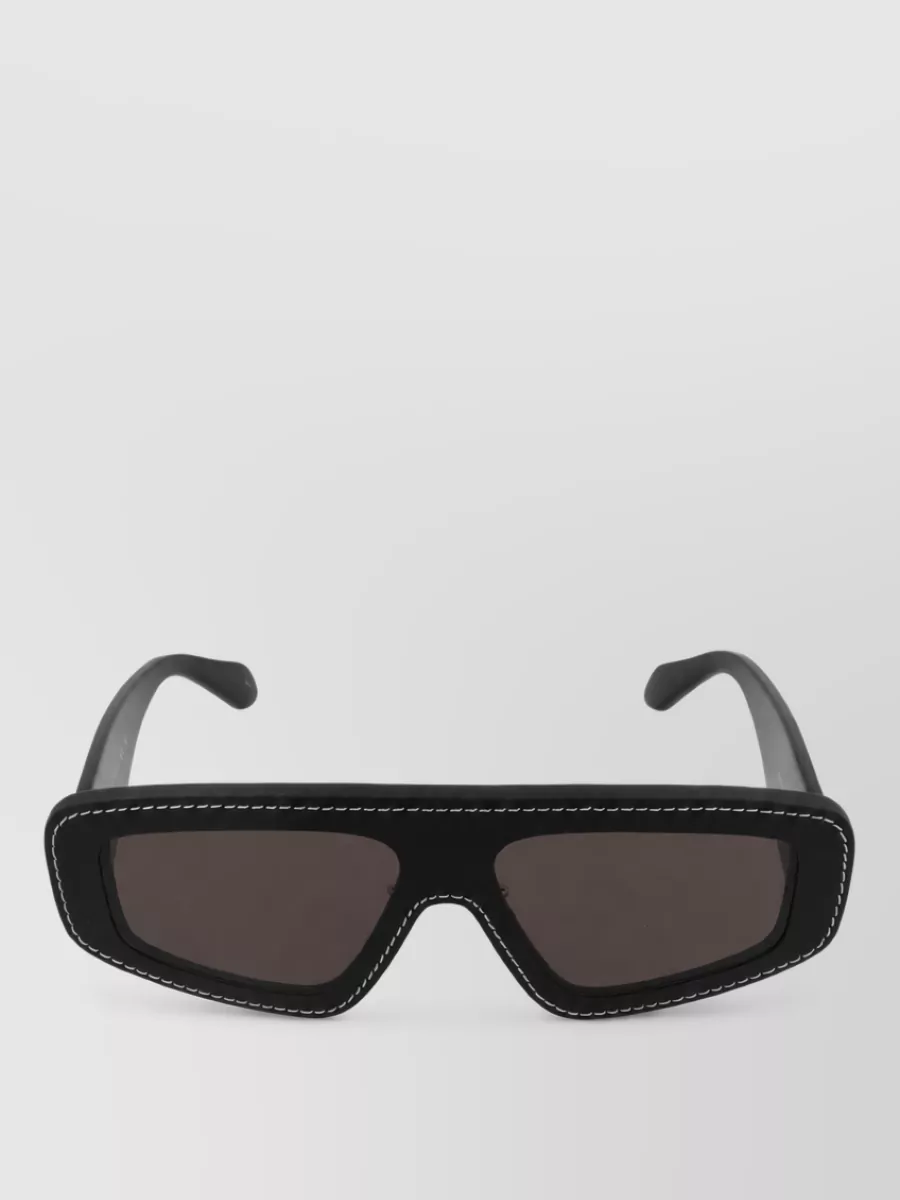 Alaïa leather sunglasses