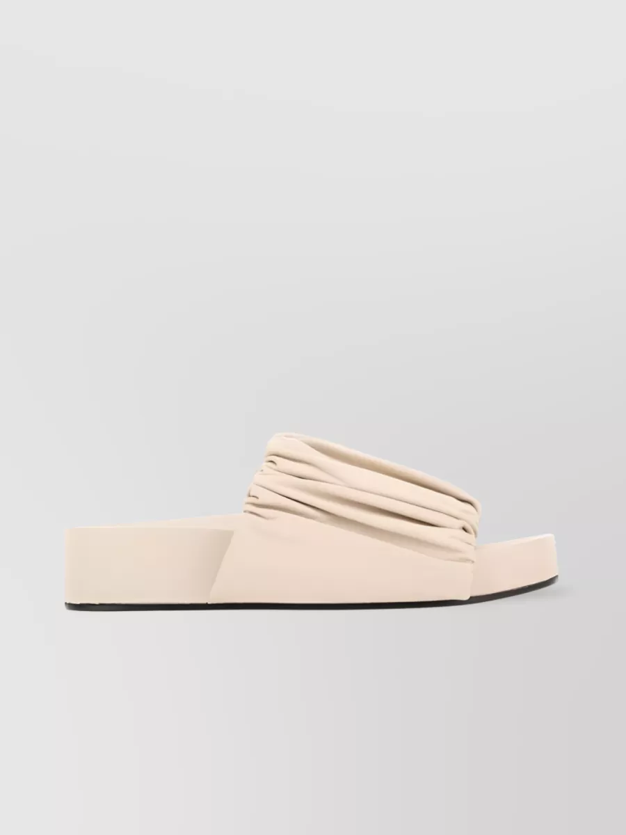 Shop Jil Sander Leather Slides With Ruched Detailing And Flat Sole In Cream