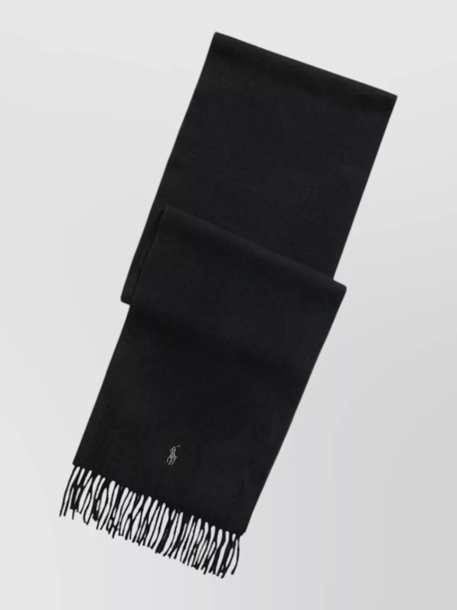 Polo Ralph Lauren Cashmere scarf — The Polo Ralph Lauren navy hat and scarf set introduces a subtle navy-and-gold dialogue with the tee’s laurel wreath, adding functional warmth and a discreet preppy accent without clutter.