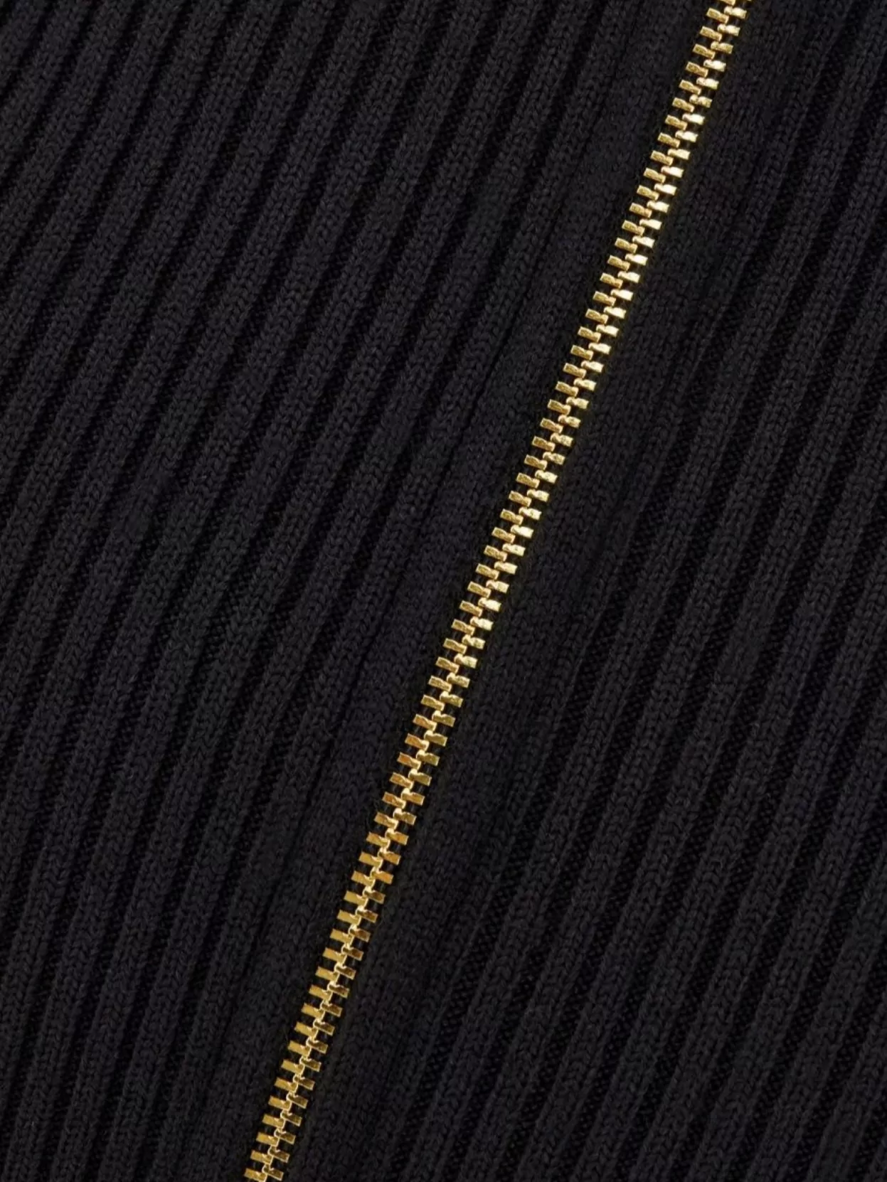 PATOU WOOL SKIRT WITH FRONT SLIT AND RIBBED TEXTURE