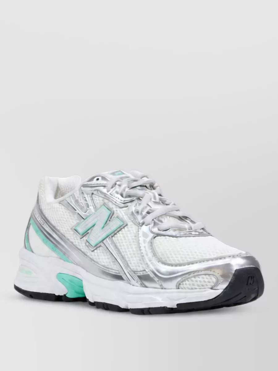 New Balance Silver Low-Top Sneakers