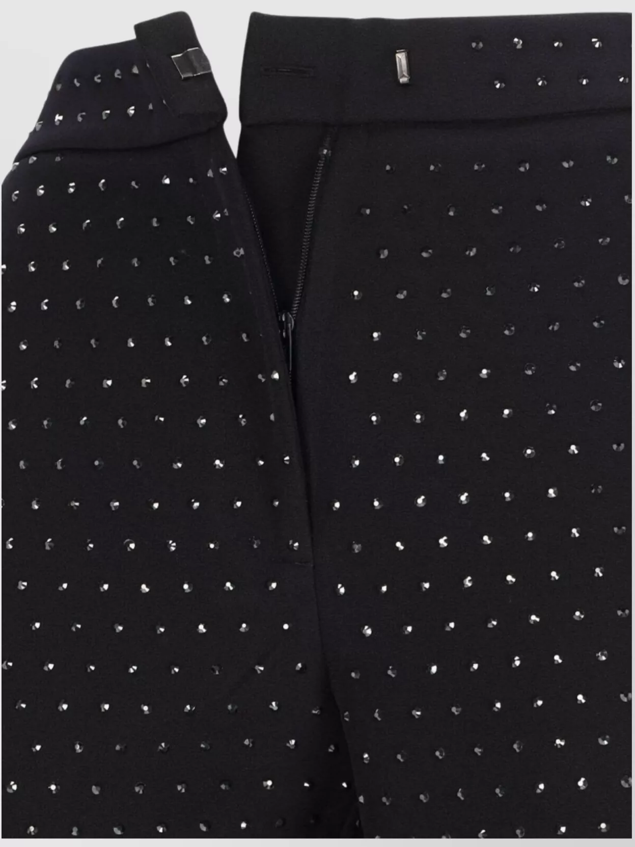 The Andamane Flared High Waist Trousers With Stud Embellishments In Black