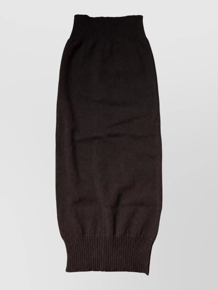 Dolce&Gabbana Cashmere knitted neck warmer scarf — The Dolce&Gabbana ribbed chocolate scarf quietly layers into the all-brown story, adding length and texture without introducing new color or branding noise.