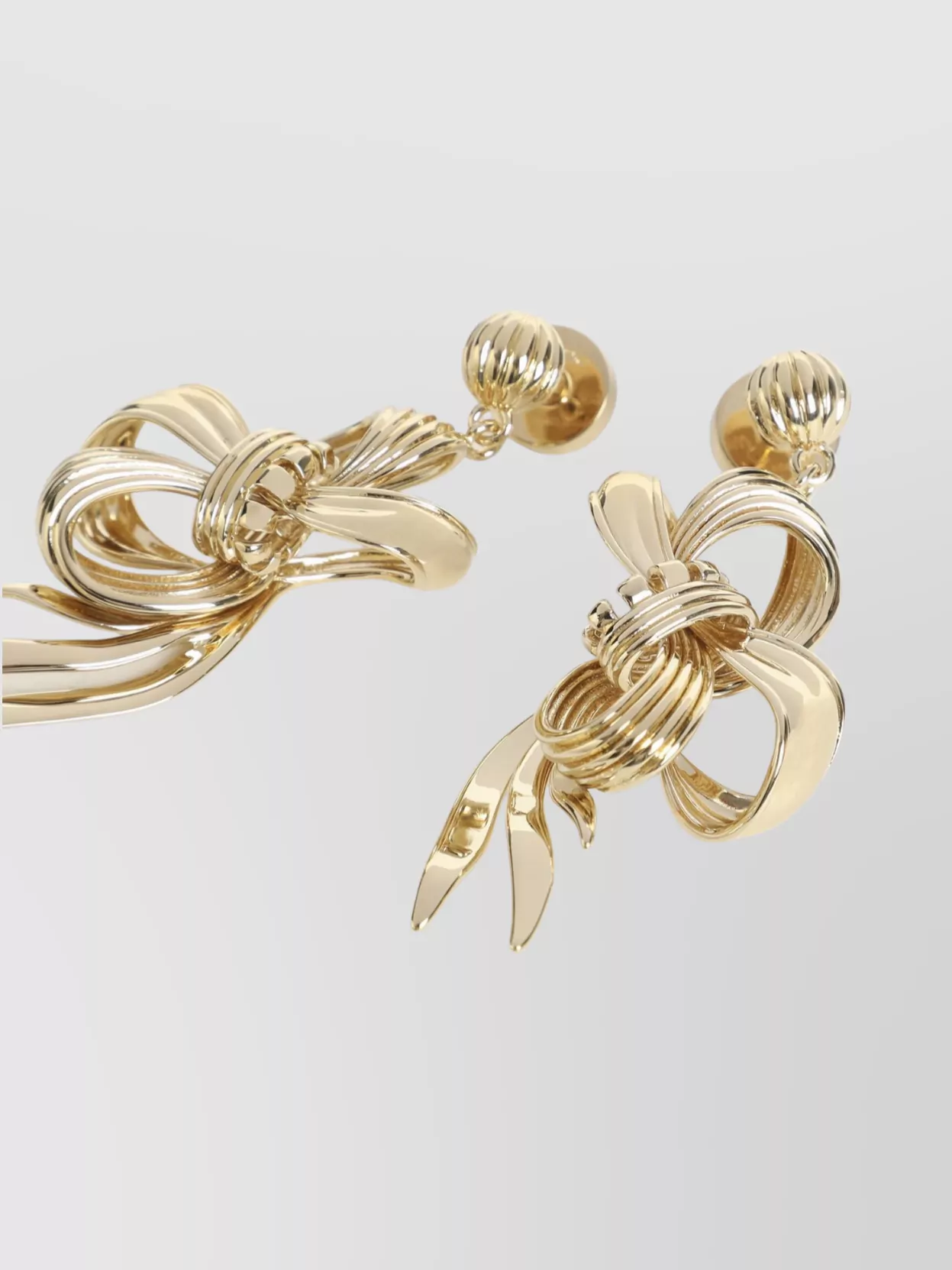Miu Miu Drop Earrings With Knot Detail And Polish In Gold