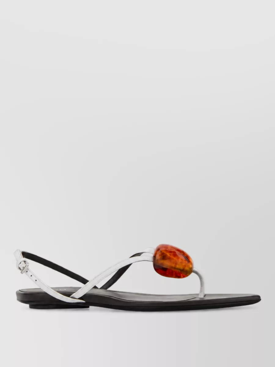 Alaïa leather slides