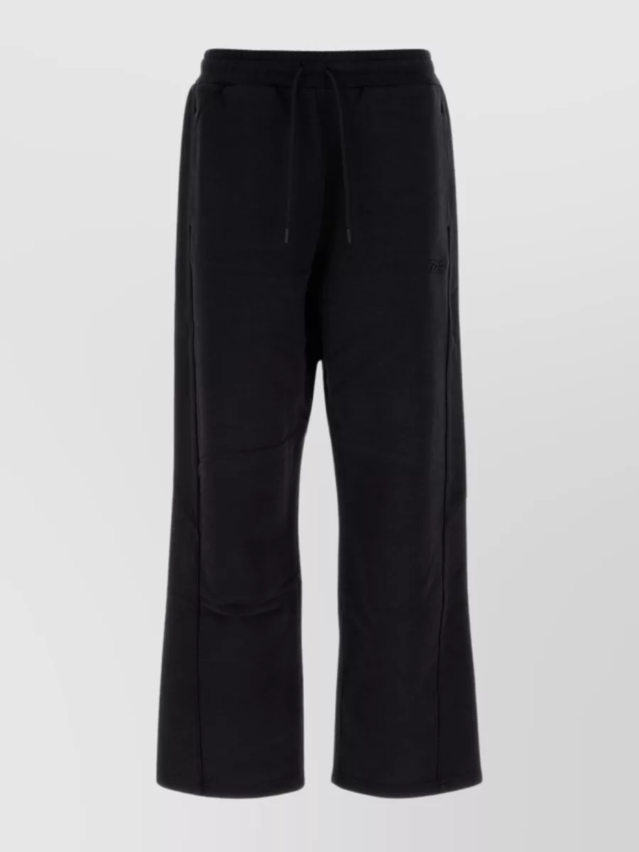 Shop Reebok Wide-leg Cotton Joggers With Seam And Patch Pockets In Black