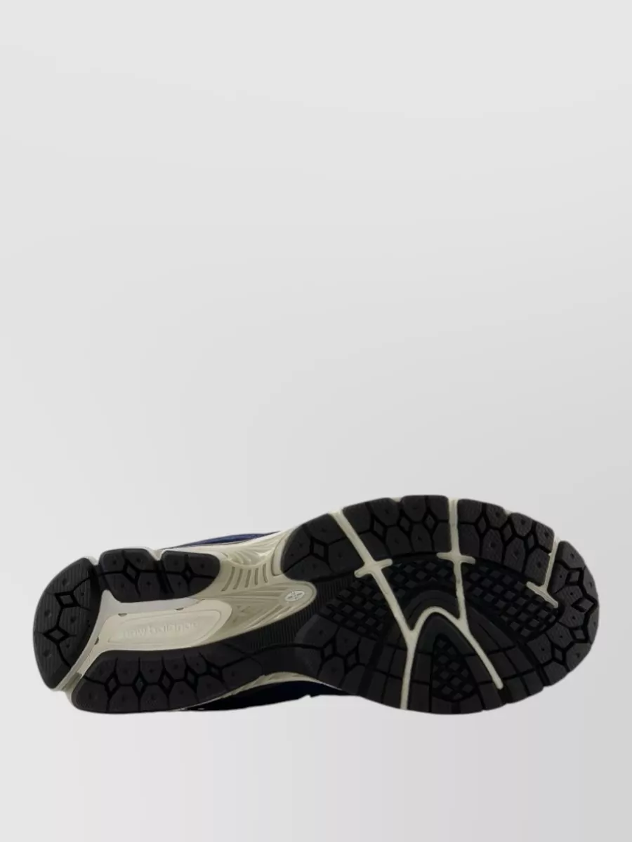 New Balance Paneled Low-Top Sneakers