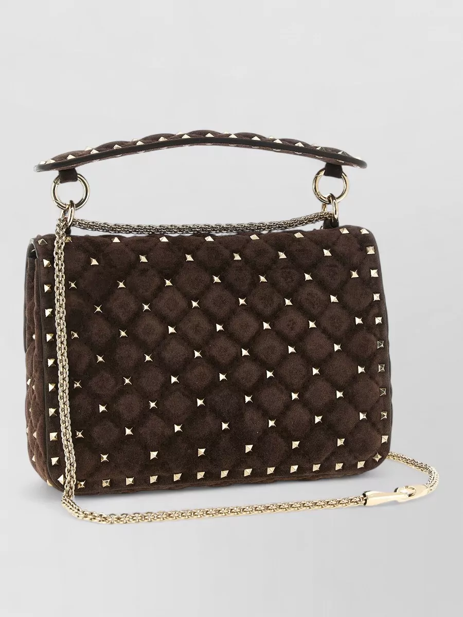 Valentino Garavani rockstud spike medium leather clutch bag